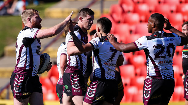 Brad Parker celebrates scoring a try for the Blacktown Workers Sea Eagles.