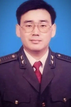 The party man: Yang Hengjun in his Ministry of State Security uniform.