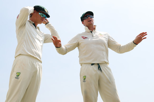 Steve Smith with Cooper Connolly (left).