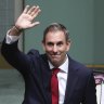 Treasurer Dr Jim Chalmers is applauded by colleagues after delivering the Budget speech.