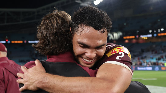 Xavier Coates and Reece Walsh of the Maroons celebrate their 38-10 win.