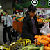 SYDNEY, AUSTRALIA - OCTOBER 22: People shop for fruit and vegetable produce at Paddy's Market on October 22, 2022 in Sydney, Australia. Treasurer Jim Chalmers will deliver the first Federal Budget for the Albanese Labor Government on October 25, 2022 - warning Australians to brace for spending cuts and limited cost-of-living relief. Focussing on rising inflation (6.1 per cent in the June Quarter) and a darkening world economy. The budget will include lower priced medicines, available from Januar