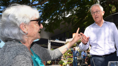 Malcolm Turnbull berated by voters in byelection pub visit