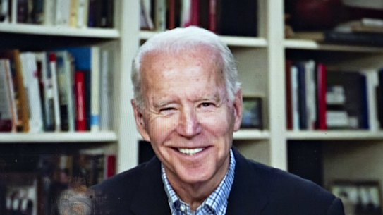 Former Vice President Joe Biden, 2020 Democratic presidential candidate, smiles during a virtual press briefing.