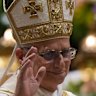 Pope Leo XIV waves after leading the Easter Vigil inside St Peter’s Basilica at The Vatican.