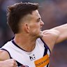 A fired-up Patrick Voss celebrates a key goal against Collingwood.