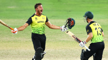 Australia’s Matthew Wade and Marcus Stoinis celebrate victory over Pakistan to reach a World Cup final that is too close to call.