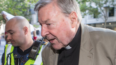 Cardinal George Pell arrives at Melbourne Magistrates Court on Wednesday.