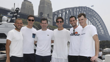 Great Britain ATP Cup team members Jamie Murray, James Ward, Tim Henman, Dan Evans, Joe Salisbury and Cameron Norrie pose for photo in front of the Sydney Harbour Bridge on New Year's Day.