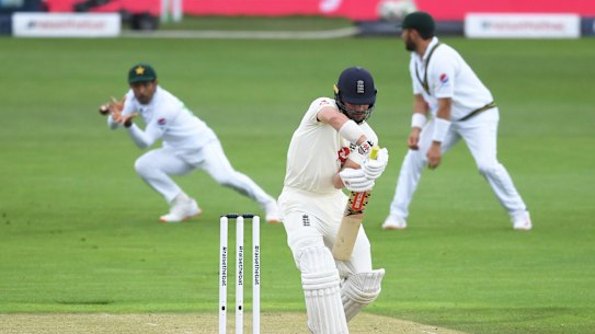 Asad Shafiq takes the catch to dismiss Rory Burns on a rain-shortened fourth day of the second Test in Southampton.