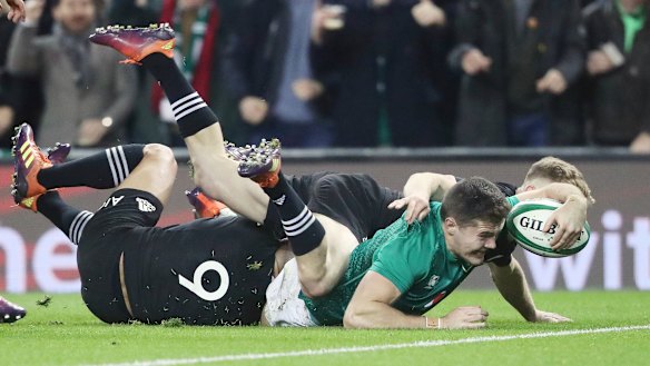 Ireland's Jacob Stockdale scores against the All Blacks in November. 