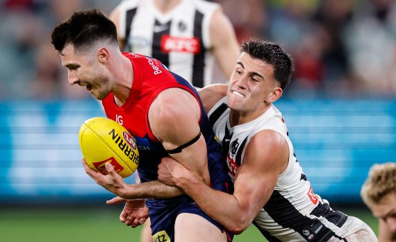 Collingwood’s Nick Daicos (right) was a menace against Melbourne, finishing with 40 disposals.