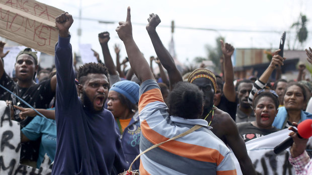 Papuans hold a rally in Timika, Papua, on August 21.