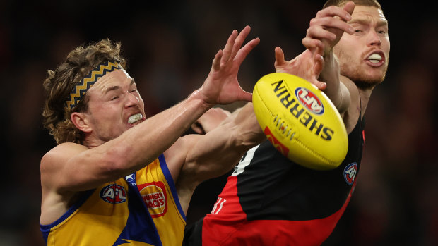 West Coast’s Jayden Hunt and Bomber Peter Wright contest the ball.