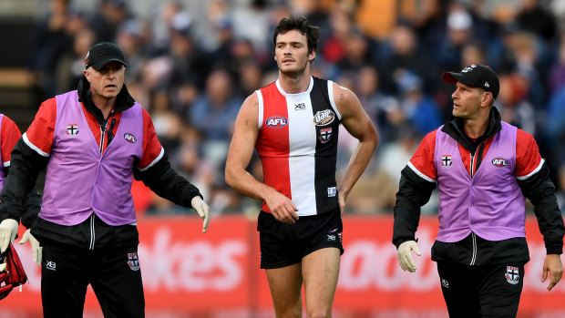 Dylan Roberton leaving the ground after his collapse in round four.