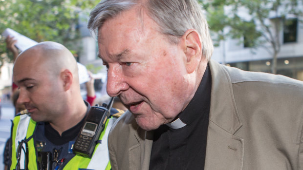 Cardinal George Pell arrives at Melbourne Magistrates Court on Wednesday.