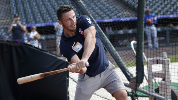 Battering ram: Sam Burgess takes matters into his own hands during a promotional visit in the US.