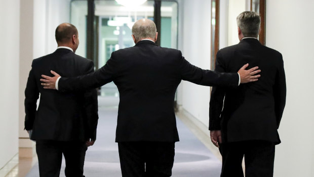 Job done: Treasurer Josh Frydenberg, Prime Minister Scott Morrison and Minister for Finance Mathias Cormann leave the press conference held after passing the government's tax cuts.