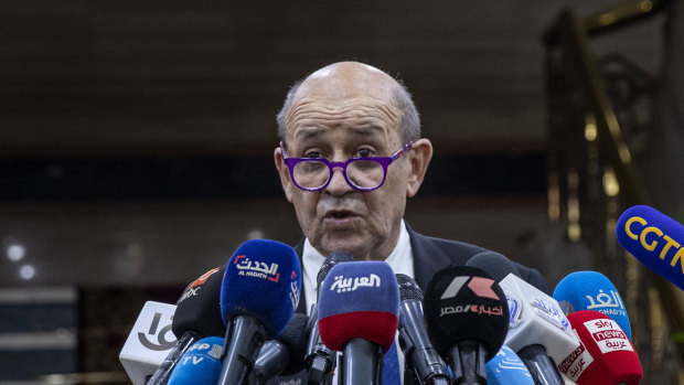 French Foreign Minister Jean-Yves Le Drian speaks during a press conference after a meeting with Muslim Grand Imam, Sheikh Ahmed al-Tayeb.
