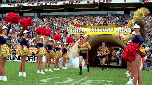 Trevor Gillmeister leads out the South Queensland Crushers in 1996.
