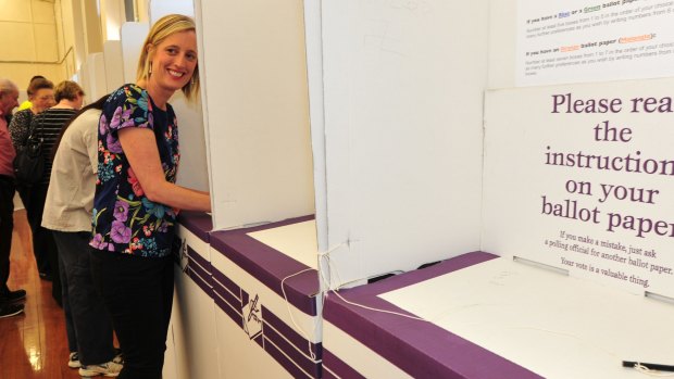 Katy Gallagher casts her vote in 2012. By the next election, Labor will have been in power for 19 years.
