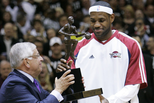 Stern presents LeBron James with the NBA's MVP trophy in 2009.