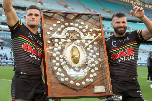 Nathan Cleary and Josh Mansour with the JJ Giltinan Shield Penrith last won in 2020.