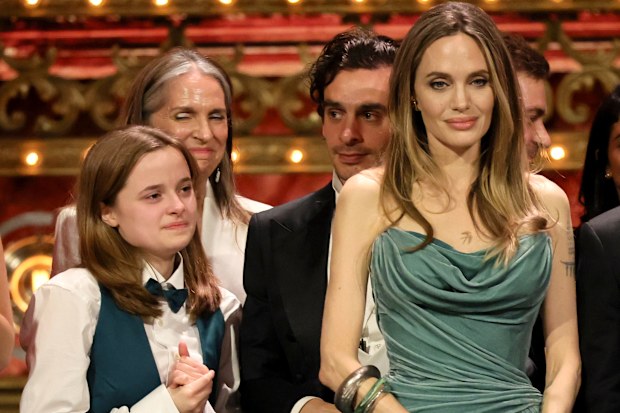 Vivienne Jolie-Pitt and Angelina Jolie accept the Tony Award for Best Musical for their play The Outsiders in June 2024.