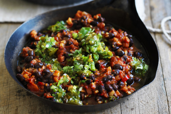 Chilli black beans with jalapeno salsa is an easy win for taco Tuesday.