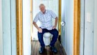 Henry Martin in his ‘chapel’ - the outdoor toilet designed and built for his home in inner-suburban Adelaide’s Eastwood.