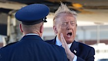 President Donald Trump yells as he arrives on Air Force One.