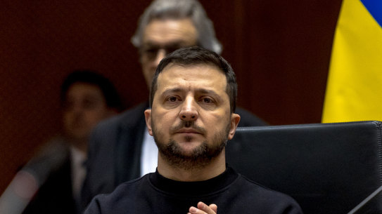 Ukrainian President Volodymyr Zelensky listens to the welcoming speech of the President of the European Parliament Roberta Metsola in the hemicycle of the European Parliament on February 9, 2023 in Brussels, Belgium. 