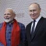 Russian President Vladimir Putin, right, and Indian Prime Minister Narendra Modi shake hands during the welcoming ceremony prior to an informal dinner on the sidelines of BRICS Summit at Kazan City Hall in Kazan, Russia.