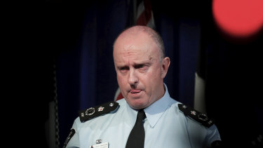 Acting Australian Federal Police commissioner Neil Gaughan fields questions over the raids. 
