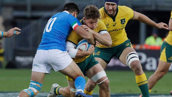 Leading by example: Michael Hooper got through a mountain of work against Italy.
