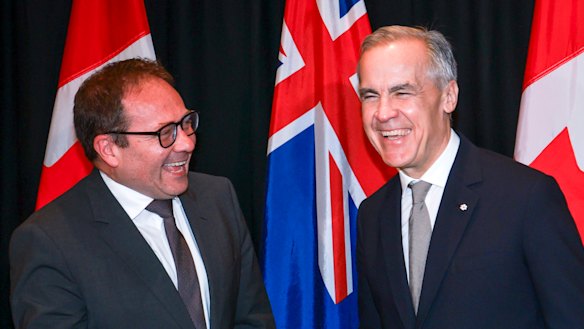 Canadian Prime Minister Mark Carney (right) with Australian Assistant Treasurer Daniel Mulino.