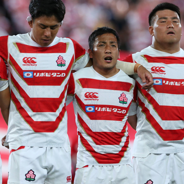 Hard work: Japan players sing the national anthem in their final warm-up clash before the 2019 World Cup.