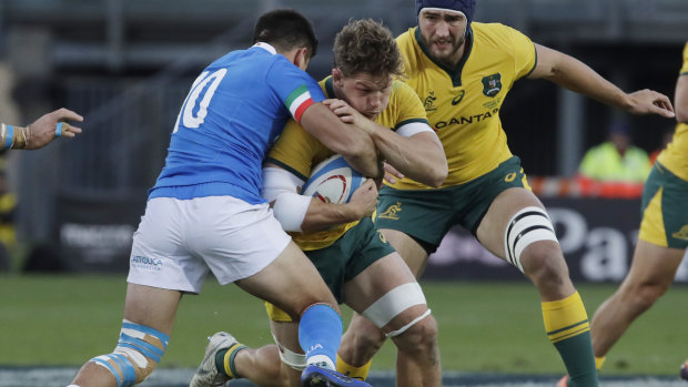 Leading by example: Michael Hooper got through a mountain of work against Italy.