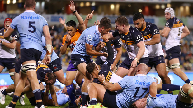 Harrison Goddard scores a try for the Brumbies