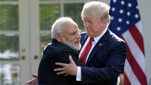 US President Donald Trump and Indian Prime Minister Narendra Modi hug at the White House in 2017.