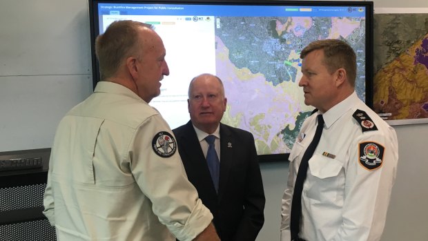 ACT Parks fire manager Neil Cooper, Emergency Services Minister Mick Gentleman, and ESA Commissioner Dominic Lane discuss the bushfire risk.