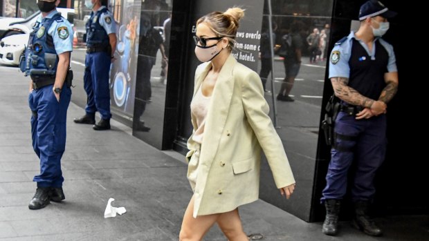 Rita Ora leaves hotel quarantine at the Meriton Suites on Sussex Street.