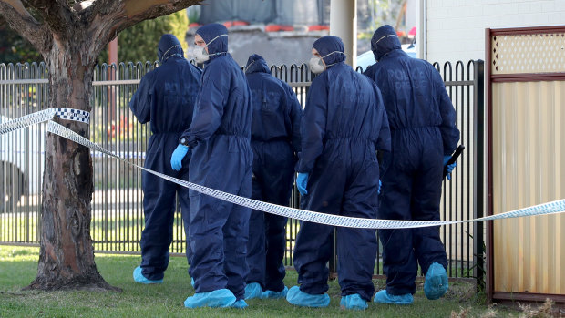 Forensic officers at the tragic scene in Bedford.