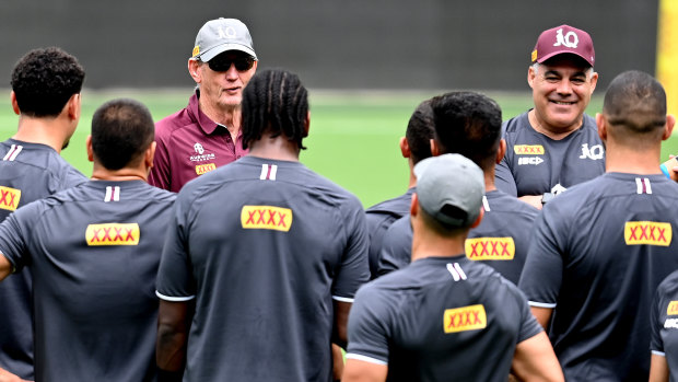 Dream team: Wayne Bennett and Mal Meninga address the Maroons squad at training on Tuesday.