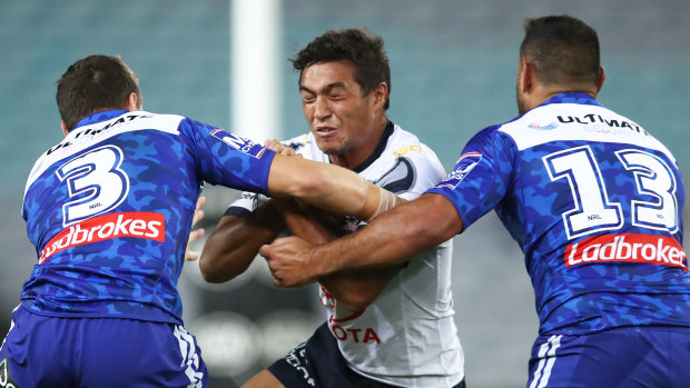 Concerning: Te Maire Martin (centre) is tackled by Kerrod Holland and Rhyse Martin of the Bulldogs last weekend.
