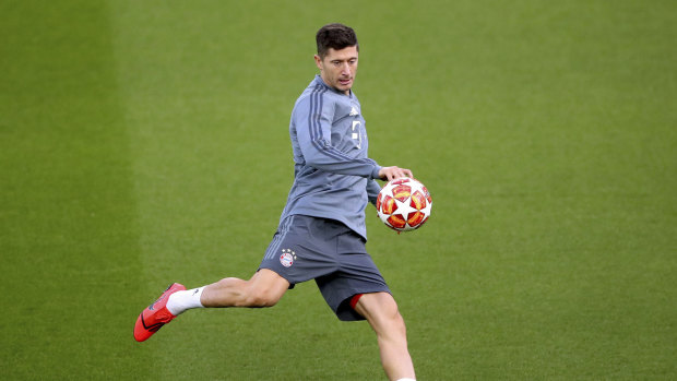 Robert Lewandowski, training at Anfield ahead of the Liverpool clash, once played for Klopp at Dortmund.