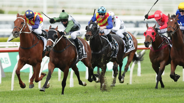 Glen Boss rides Yes Yes Yes (second from left) to victory in The Everest on Saturday.