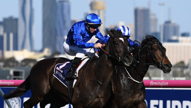 Meant to be: Glyn Schofield (left) rides Avilius to victory in the race named after his famous grandfather, Bart Cummings, at Flemington in October.