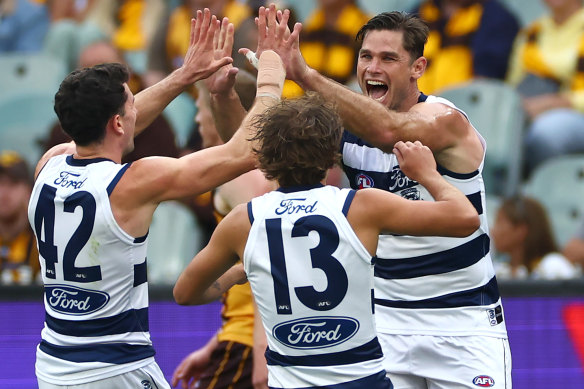 Tom Hawkins celebrates a goal.