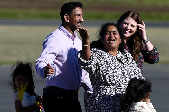 Priya and Nades Murugappan and their daughters Kopika and Tharnicaa arrive home to Biloela.